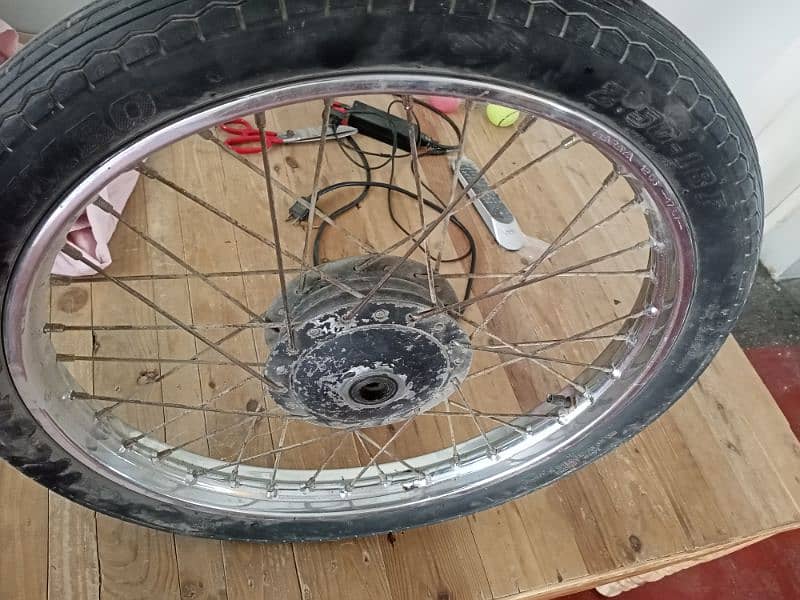 Honda 125 front Araya Rim with Tyre tube 6