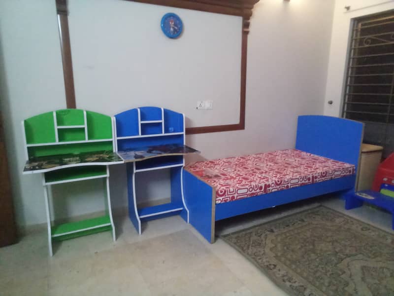 Kids single beds with side tables and matresses. 1