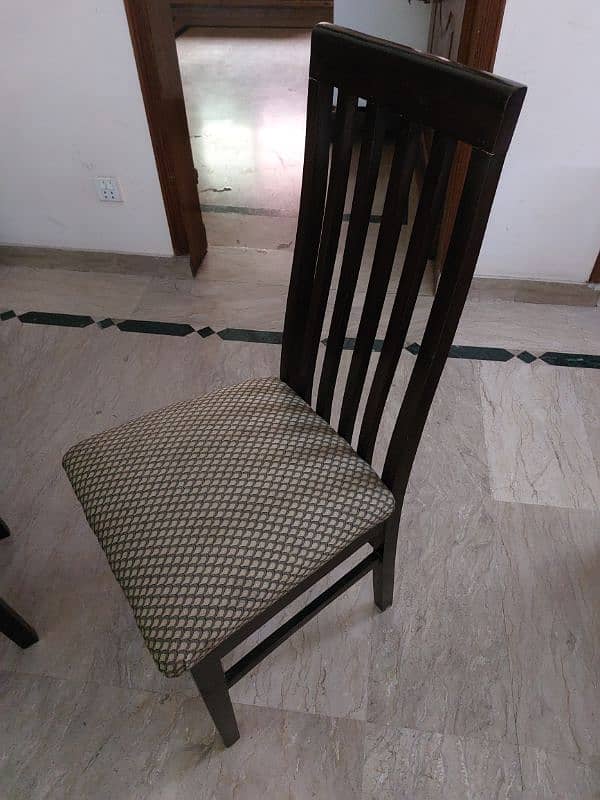 Wooden dining table and six chairs for sale 1