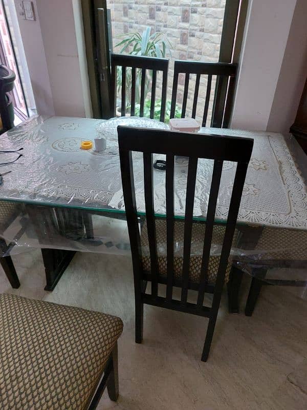 Wooden dining table and six chairs for sale 2