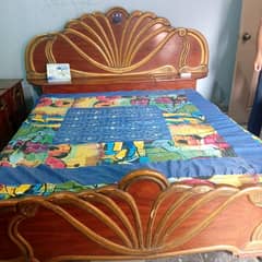 double bed with side tables and matress