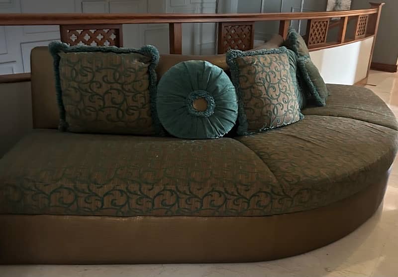 5 seater curved sofa with cushions 1