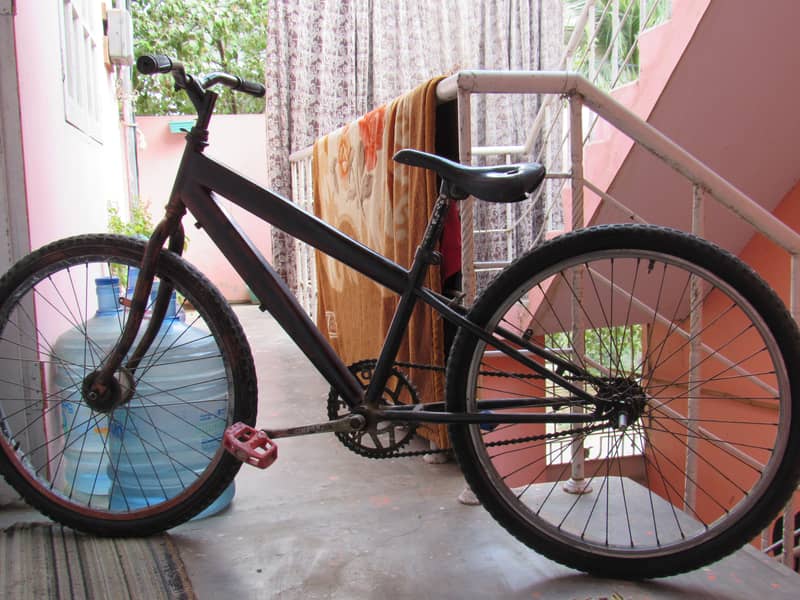 A USED BIICYCLE 26 SIZE 5