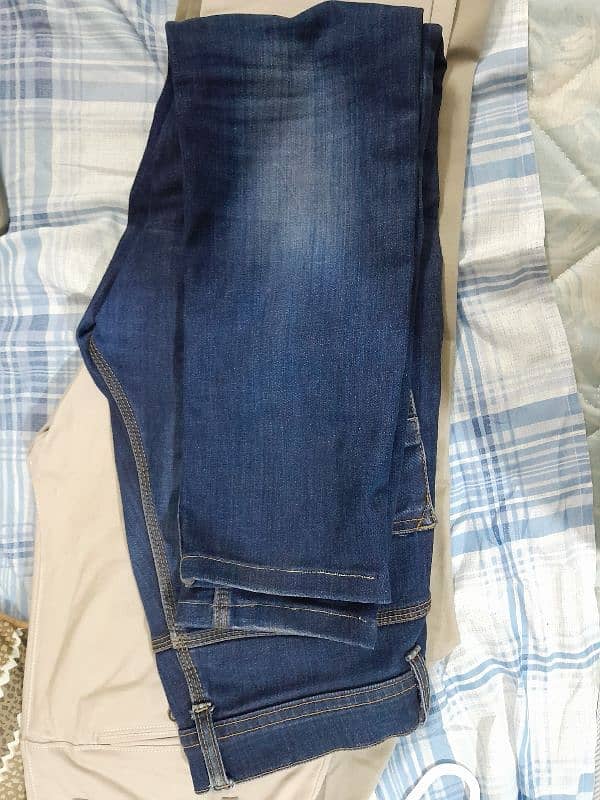 6x items (jeans, cotton pants, 2-piece suit, dress pant) 9