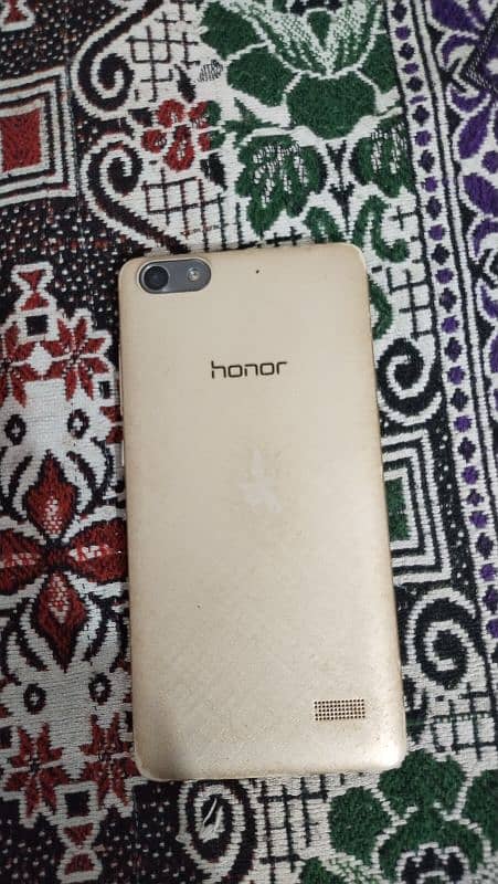 Huawei honor 4C 3