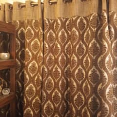 curtains. . . 4 curtains dark brown and golden colour