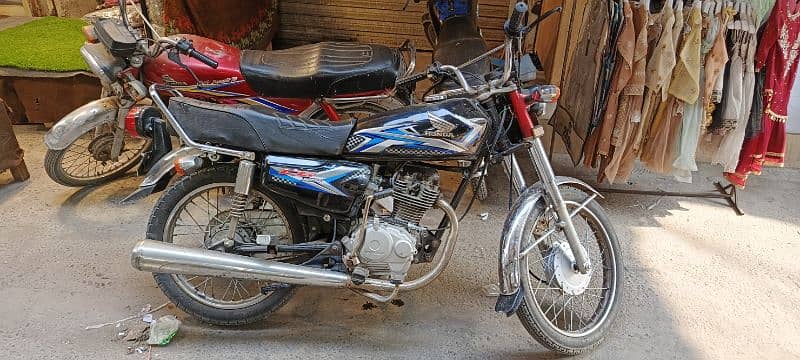 Honda 125 2009 modal number 2012 may lga hai bht achi chal rhi ha 1