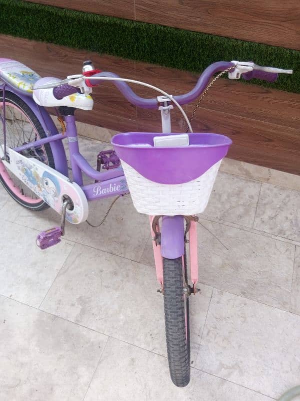 barbie bicycle 20 inches 6-8 ages with bucket and extra seat 1