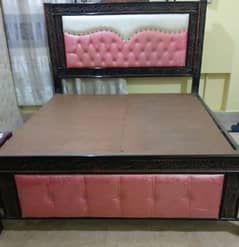 Double Bed with no Mattress and One Computer Table