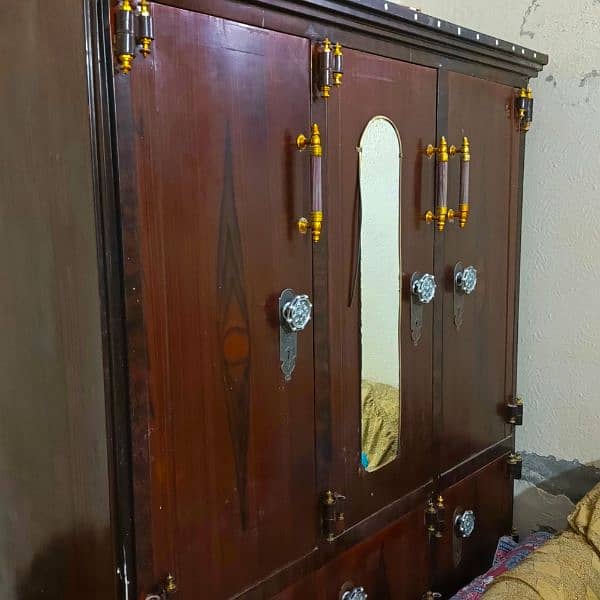 large 3 door iron cupboard near 6.5 feet height 5.5 feet width 1