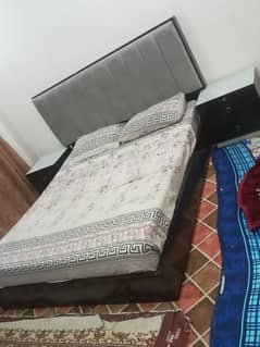 double bed with side table