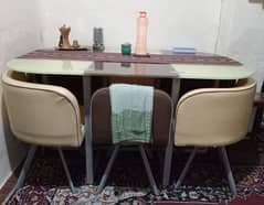 A very trendy dining table is available for sale.