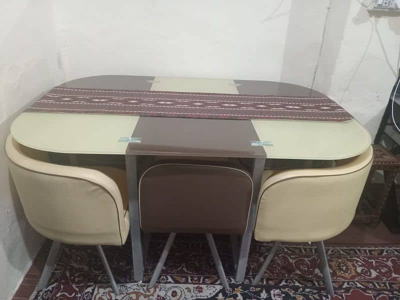 A very trendy dining table is available for sale. 1