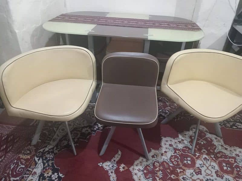 A very trendy dining table is available for sale. 3