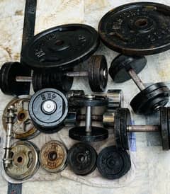 2-Bench Press, Plates with Rods, Dumbbels for sale