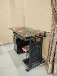 Computer table with glass on top