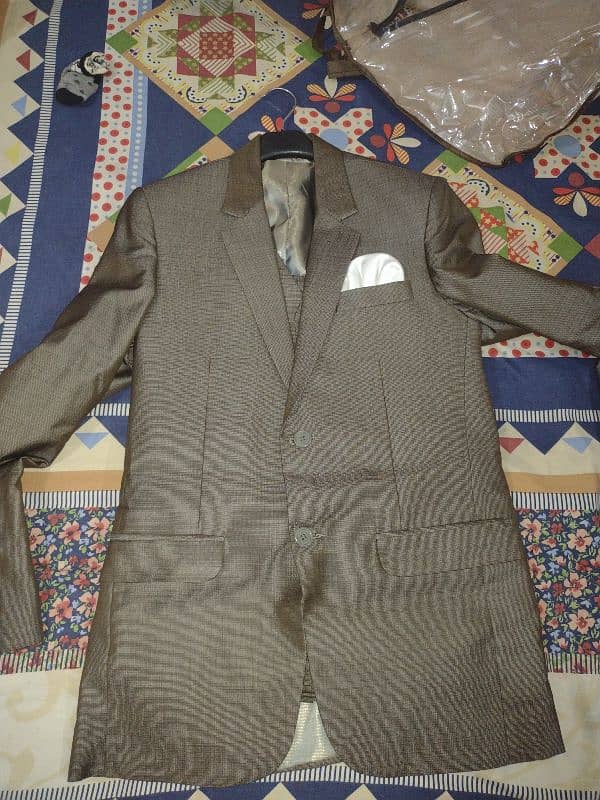 Sherwani and Three pieces 1