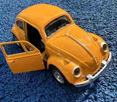 DIE CAST MODEL of Volkswagen Beetle.