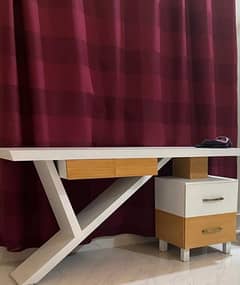 bed with side table and study table