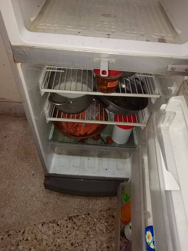 rifrigerator for sale, price is negotiable and two door  fell company 0