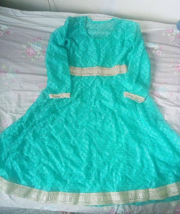 New net frock for sale. For 15 to 17 years old. 1