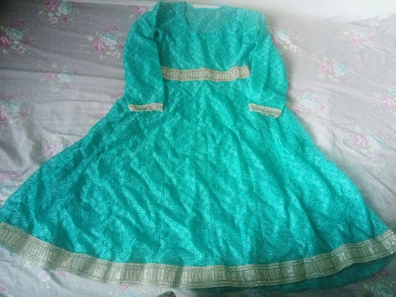 New net frock for sale. For 15 to 17 years old. 2