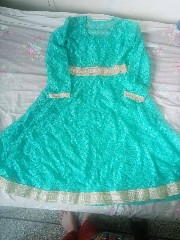 New net frock for sale. For 15 to 17 years old. 4