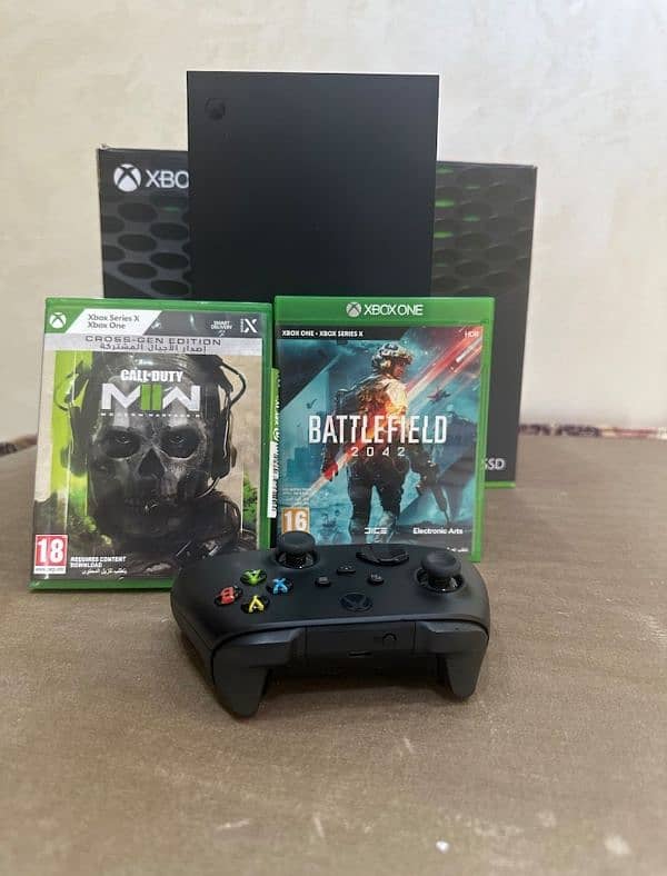 xbox series x with 2 games 0