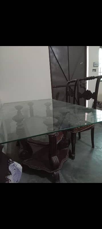 dinning table with six chairs, sho case and dressing table 1