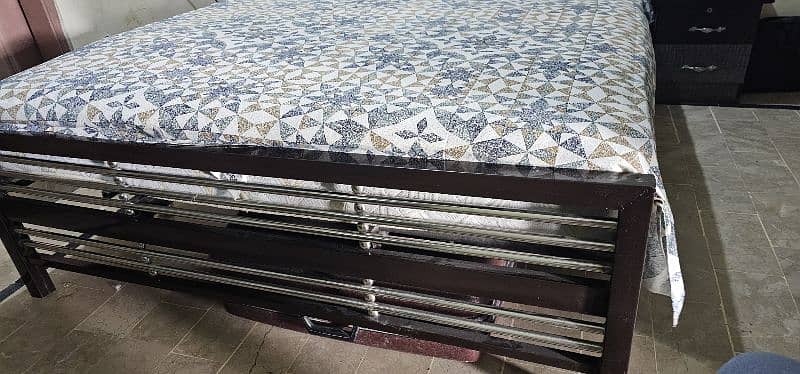 iron bed in good condition, without mattress. 1