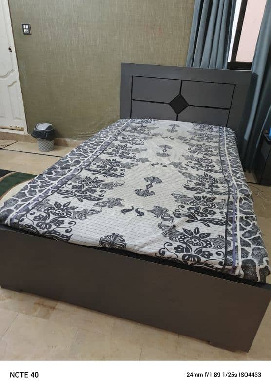 selling wooden bed 2