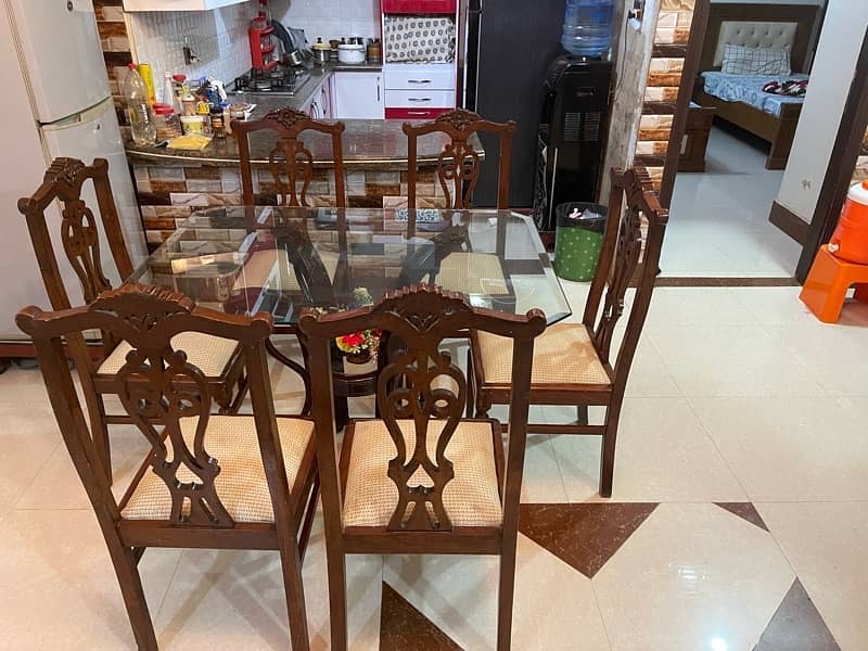 glass dinning table with shisham wooden chairs 0