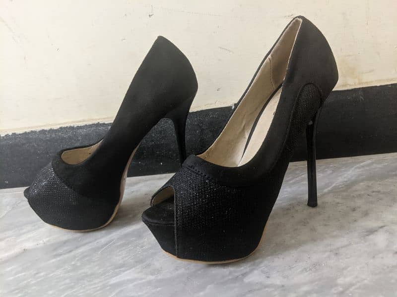 Black stiletto heels 0