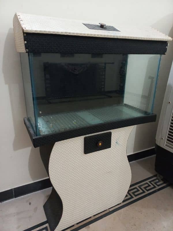 2.5 feet AQUARIUM( minor leakage ) with fiber coated stand 2