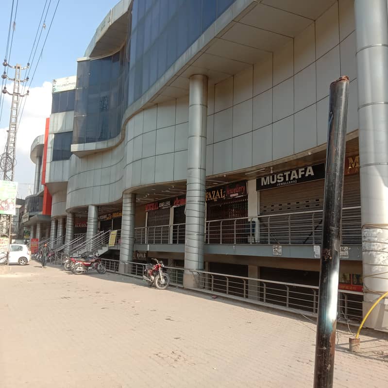 Commercial shop on hub of main muree road electronic market 1