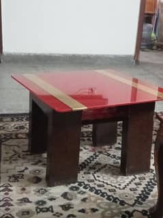 Three pieces center table set with red glass top