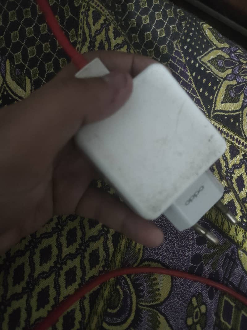 Oppo reno ka original charger hai 0