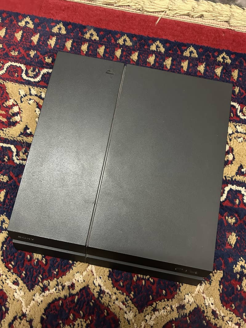 Ps4 500gb with 4 games 1