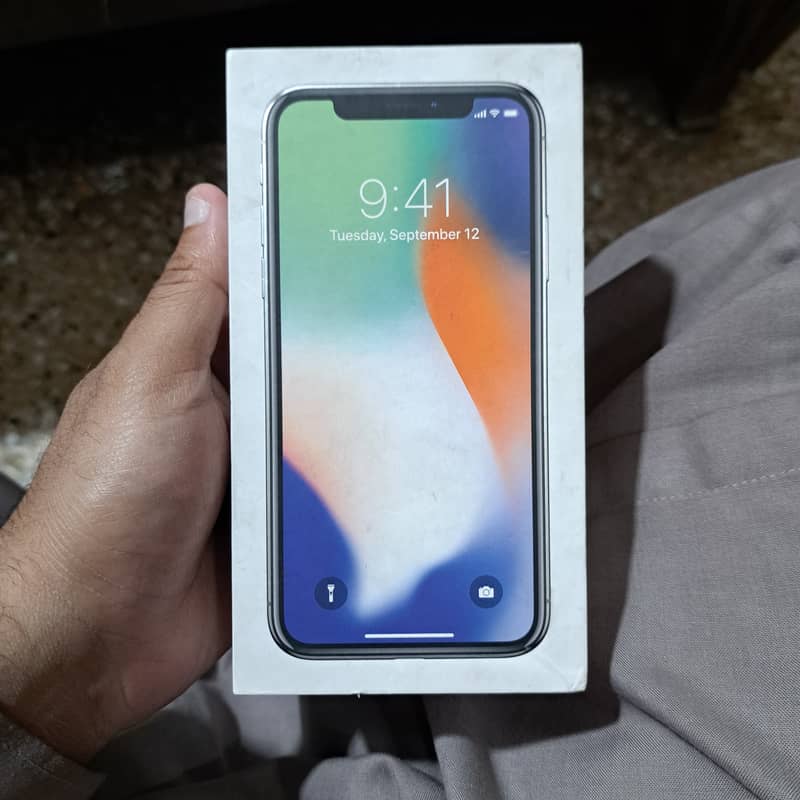 I phone x silver 64GB PTA proved 5