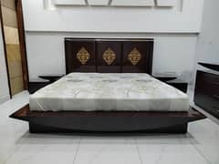 Bed with mattress, side tables, dressing.     03709104250