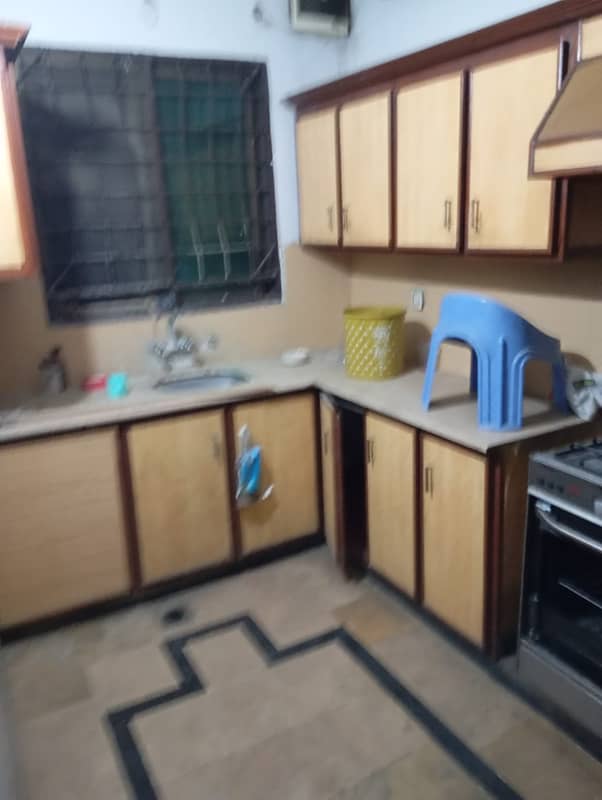 1 KANAL UPPER PORTION FACING PARKAVAILABLE FOR RENT IN JOHAR TOWN NEAR DOCTORS HOSPITAL 11