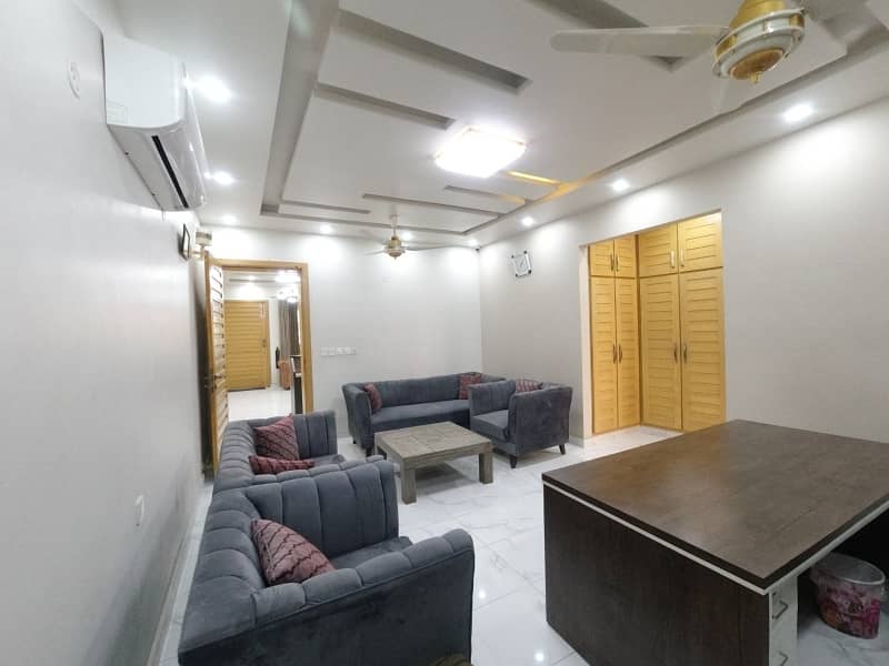 10 Marla Semi Furnished Brand New. Double Unit House Available. For Sale In Faisal Town F-18 On Main Double Road. In Block A Islamabad. 4