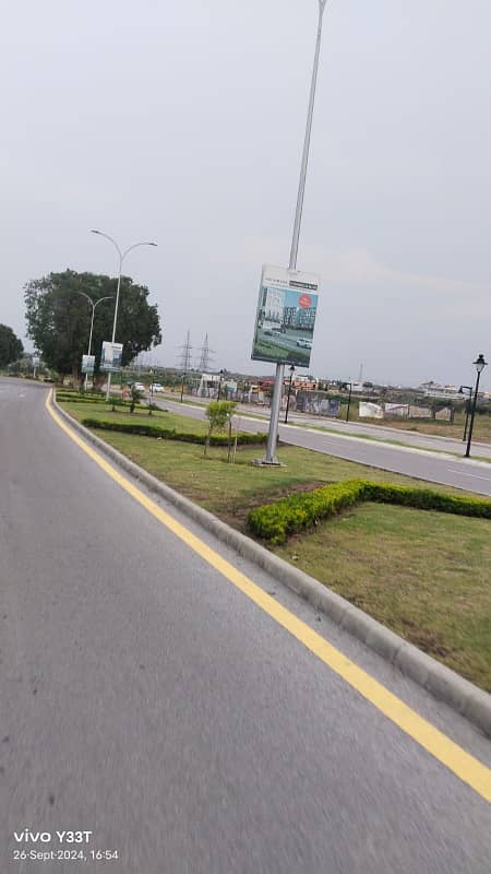 18 Marla Commercial Plot With ( Top Heighted Location & With 90 Foot Front )For Sale In B04,Central Commercial In , DHA Phase 05 , Islamabad 1