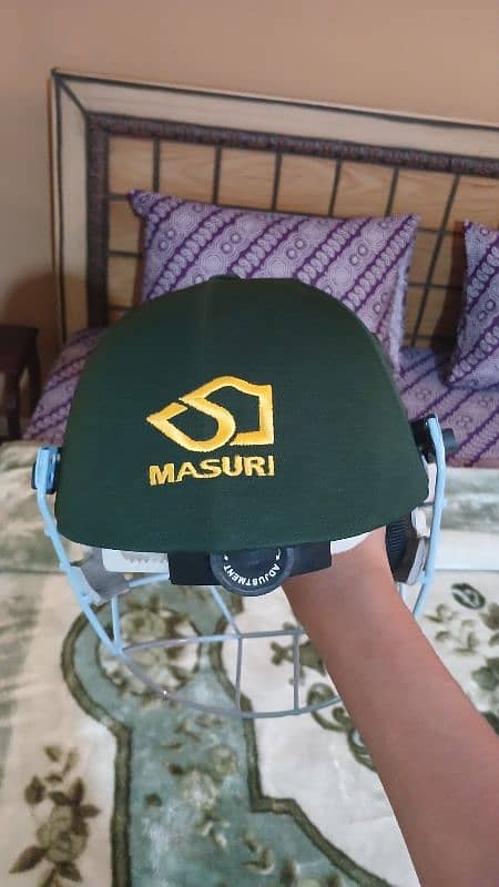 Cricket helmet. 1