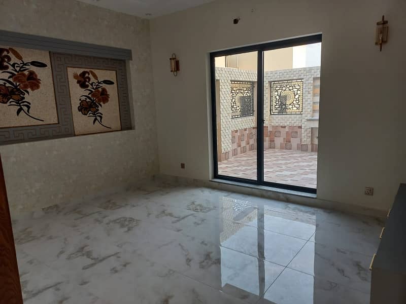 10 MARLA 50 FT WIDE BRAND NEW HOUSE FOR SALE IN DHA RAHBAR BLOCK E WITH SOLAR PANELS 8