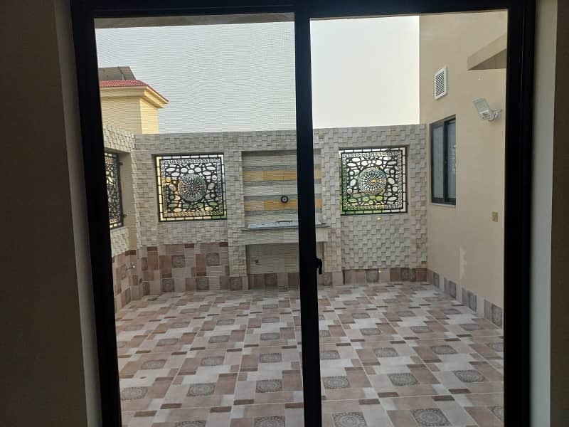 10 MARLA 50 FT WIDE BRAND NEW HOUSE FOR SALE IN DHA RAHBAR BLOCK E WITH SOLAR PANELS 11