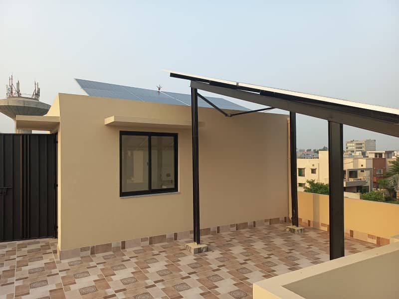 10 MARLA 50 FT WIDE BRAND NEW HOUSE FOR SALE IN DHA RAHBAR BLOCK E WITH SOLAR PANELS 15