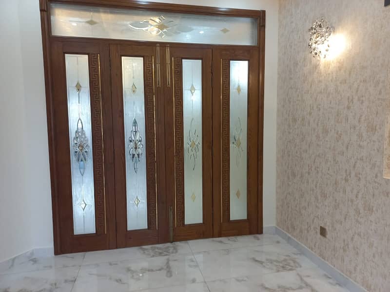 10 MARLA 50 FT WIDE BRAND NEW HOUSE FOR SALE IN DHA RAHBAR BLOCK E WITH SOLAR PANELS 32