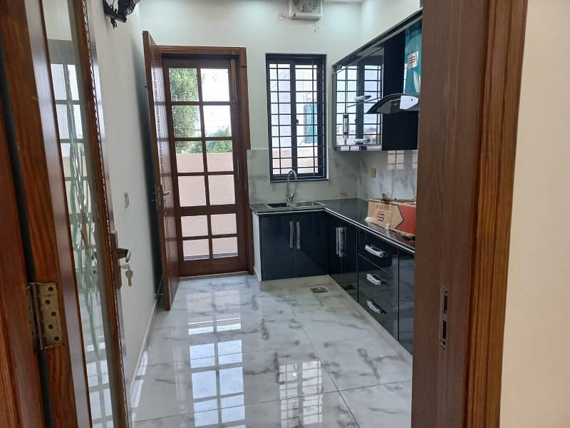 10 MARLA 50 FT WIDE BRAND NEW HOUSE FOR SALE IN DHA RAHBAR BLOCK E WITH SOLAR PANELS 35