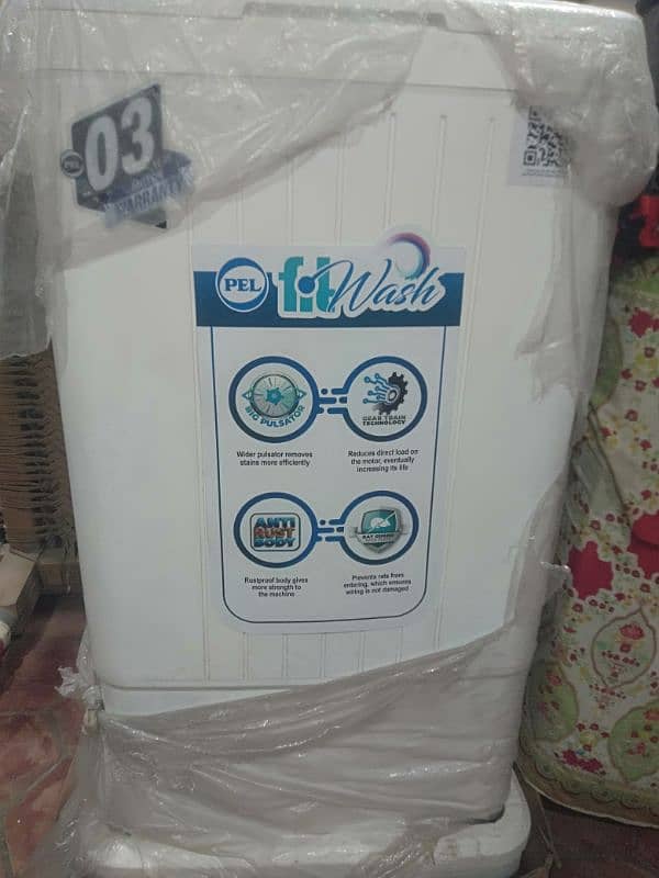 Pel washing machine with three years worenty in white color 1